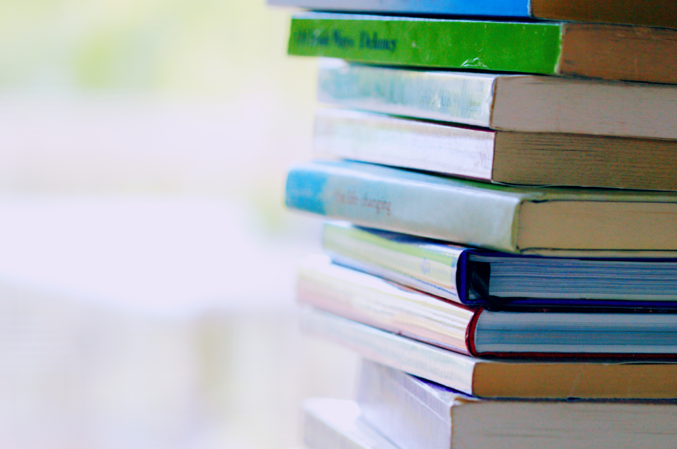 interior design books stacked on the right side