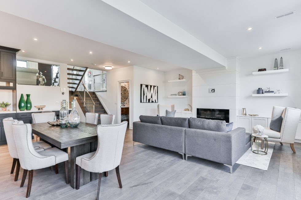 open floorplan living and dining room with a neutral color palette