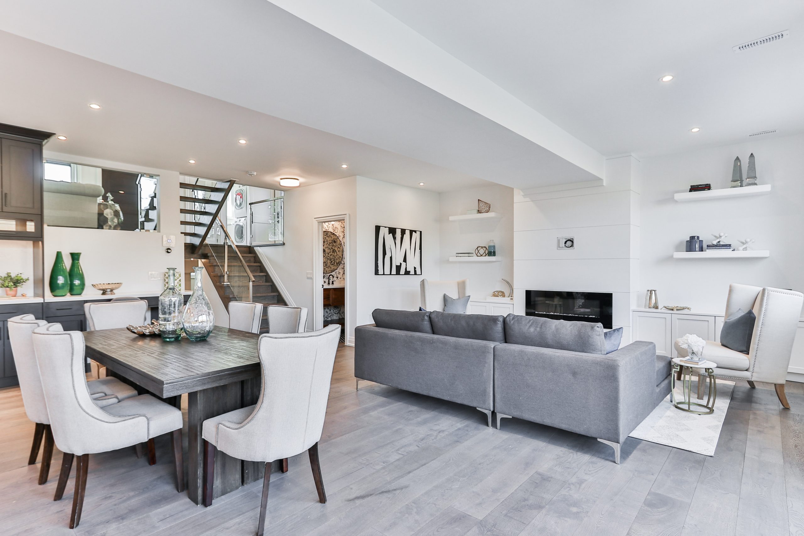 open concept kitchen living room and dining room