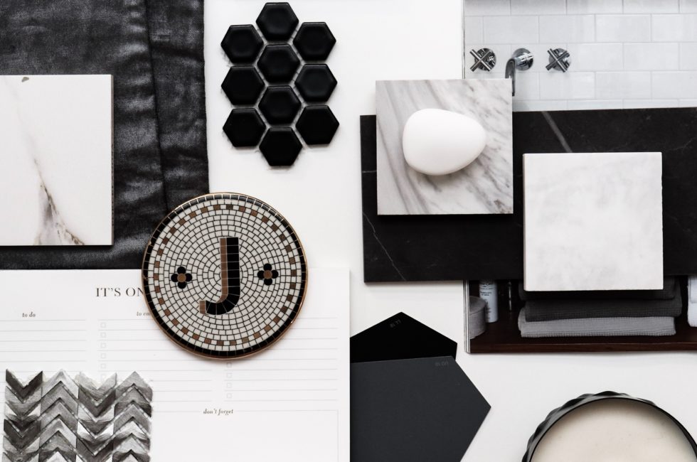 black and white interior design mood board featuring different materials in black and white