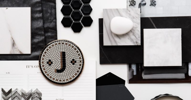 black and white interior design mood board featuring different materials in black and white